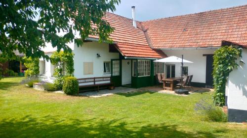 Okrouhla Apartamento | Prázdninová chalupa s uzavřeným dvorem a zahradou