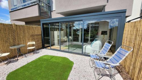 Letnany Apartamento | Praha Letňany, zimní zahrada, parkování v garáži zdarma