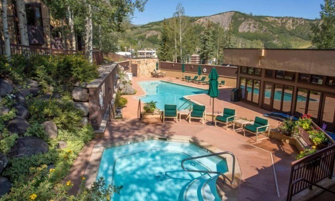 Snowmass Village Cabina | Premier Ski in, Ski out 2 Bedroom Colorado Vacation Rental Steps From the Ski Slopes With Hot Tub and Pool