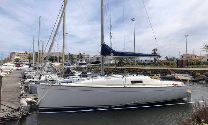 Naturist Village Alquiler De Eote | Pretty sailboat at the quay on the quiet side of the naturist port