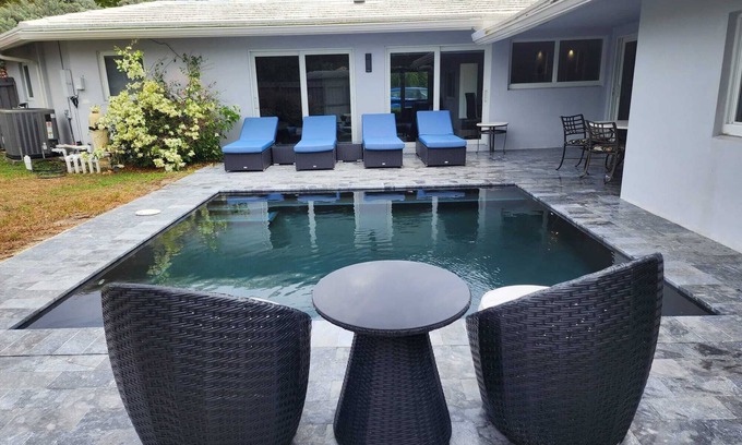 Coral Ridge Casa | Pristine and Modern Bayview Bungalow With Heated Pool!