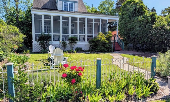 Cape May Point Casa | Pristine, Cozy, 4 bedroom Beach Cottage with a 40 foot screened in front porch!