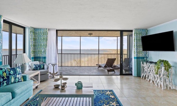 Punta Rassa Condominio | Pristine Waterfront Residence with Panoramic Water Views - Pool Open!