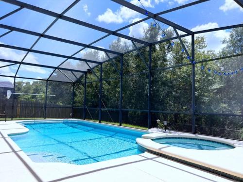 Crescent Lakes Casa | Privacy 4 Bed 3 Bath Pool Home with Spa home