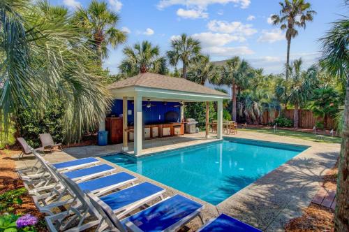 Isle of Palms Casa | Private Pool Putting Green Steps to Isle of Palms Beach Paradise on Palm
