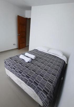 Callao Casa | PRIVATE ROOM 13 minutes from the Airport With kitchen and shared bathroom