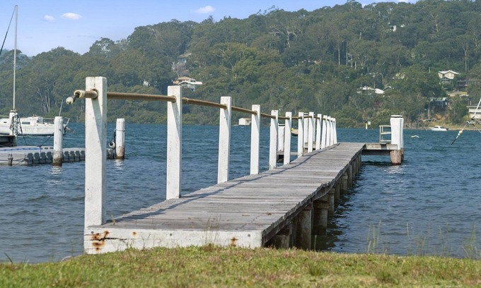 Pretty Beach Central Coast Casa | Private Sands - Nestled in one of the most envious waterfront positions on the exclusive waterfront strip of Wagstaffe, is this sublime waterfront haven with a north east aspect. Unrivalled waterfront facilities including a private sandy beach, mooring...