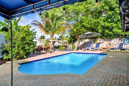 Garden Isles Casa | Purely Pompano, Pool, Water front, Paddleboard, Beach, 5 bedroom 3 bath