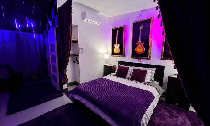 Bearss Plaza Hotel | Purple Rain Hotel Room with Pool and Hot Tub