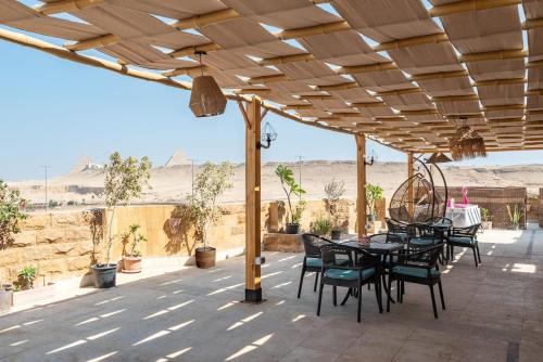 Pyramids Gardens Casa | Pyramidia Serene with Rooftop, Pool & pyramids view