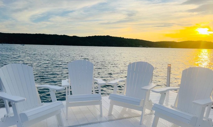 Petoskey Cabaña | Quaint cottage with 2 separate homes and dock on the North Arm of Walloon Lake.