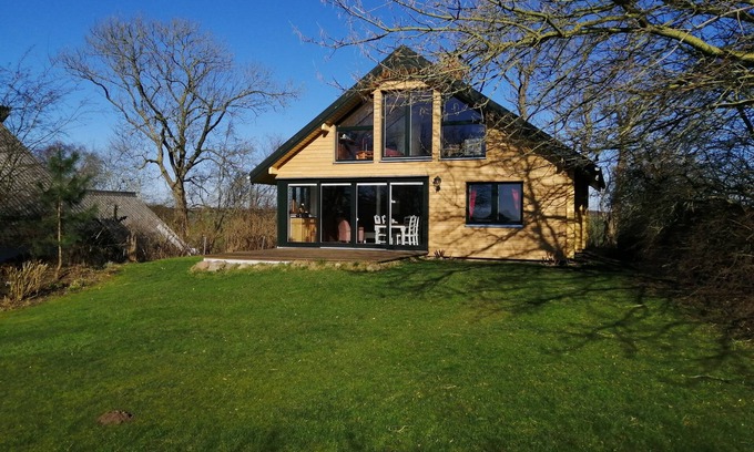 Gunneby Casa | Quaint, modern log cabin with barrel sauna, panoramic windows, Schlei view.
