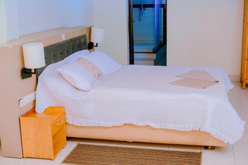 Nyanza Cama Y Desayuno | Quality Inn Motel, Nyanza