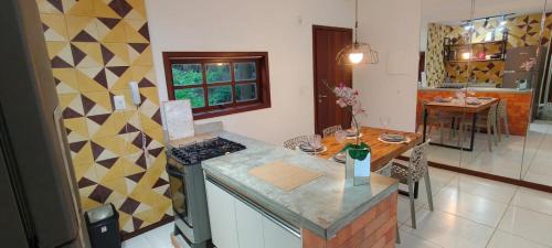 Pescaria Apartamento | Quarto e sala pratagy