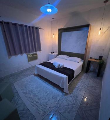 Jardim Primavera Casa | Quarto suite em Caraguatatuba