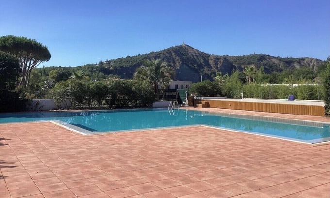 Ruoms Apartamento | Quiet, bright apartment with private garden and shared pool.