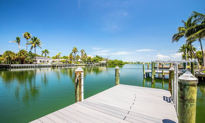 Saint Armands Key Casa | Quiet peaceful home on the canal with a dock; 2 minute walk to St Armands Circle