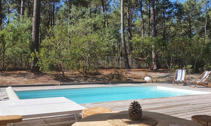 Lacanau-Ocean Casa | "Sea Pines & Sun": casa de madera tranquila en el borde del bosque con piscina climatizada
