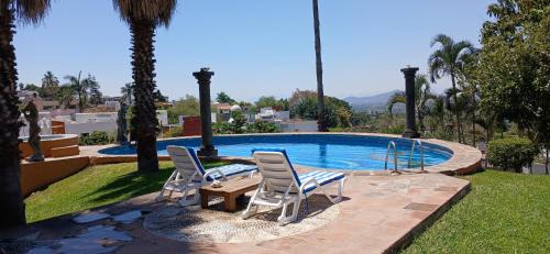 Tres de Mayo Casa | Quinta Cristina Burgos