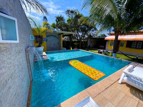 Unamar Casa | Recantos Pinheiros - Casa inteira, até 15 hóspedes - Piscina privativa, sinuca, ar condicionado e TVs nos 4 quartos - Condomínio Orla 500, lado praia - Unamar, Cabo Frio-RJ