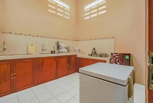 Dinoyo Hotel | RedDoorz Syariah near Taman Rekreasi Sengkaling 2