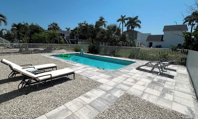 Laguna Shores Casa | Redfish Retreat - South End Pool Home