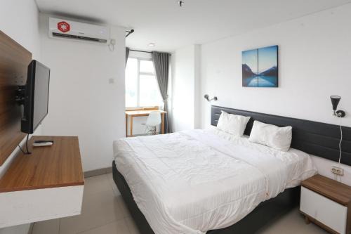 Cikarang Apartamento | RedLiving Apartemen Enviro Cikarang - Stars Rooms
