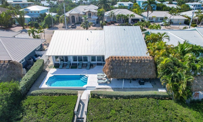Coury Casa | Reel 'Em In: Your Beautiful KCB Retreat, Private Pool, Dock, Tiki Hut, Cabana Club & Dog-Friendly!
