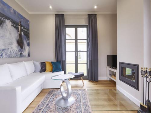 Kreptitz Casa | Reetland am Meer - Premium Reetdachvilla mit 3 Schlafzimmern, Sauna und Kamin E15