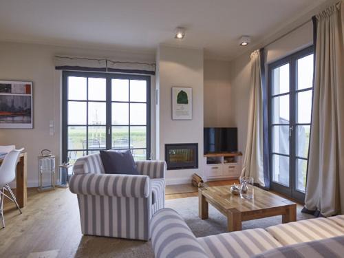 Kreptitz Casa | Reetland am Meer - Premium Reetdachvilla mit 2 Schlafzimmern, Sauna und Kamin E22
