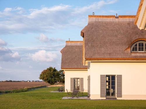 Kreptitz Casa | Reetland am Meer - Premium Reetdachvilla mit 2 Schlafzimmern, Sauna und Kamin E04