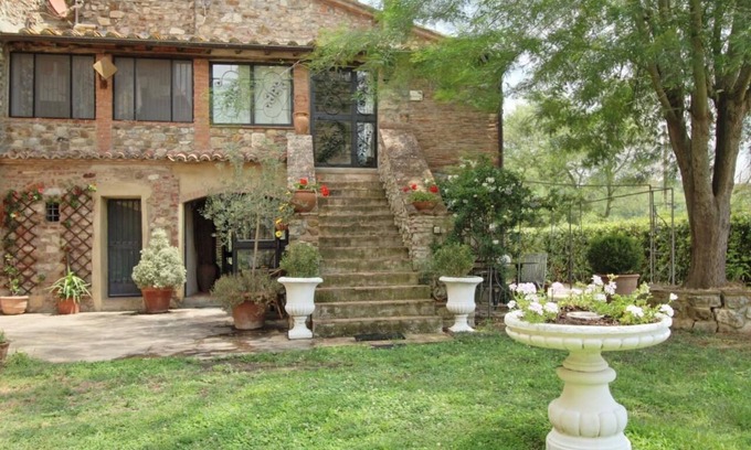 Castiglione della Pescaia Apartamento | Reggia, in small medieval village characteristic apartment with fireplace