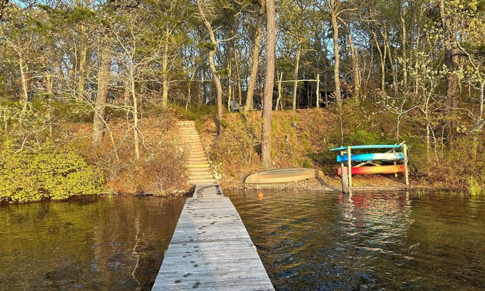 Harwich Casa | Relax in a tranquil log home on direct lake front property. The Hermitage awaits