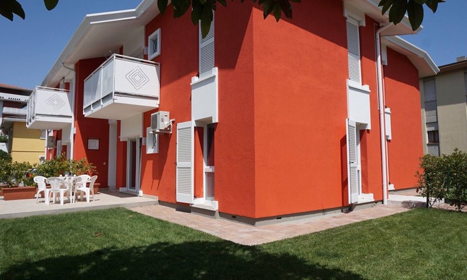 Porto Santa Margherita Apartamento | Vacaciones relajantes en la playa - piso con jardín