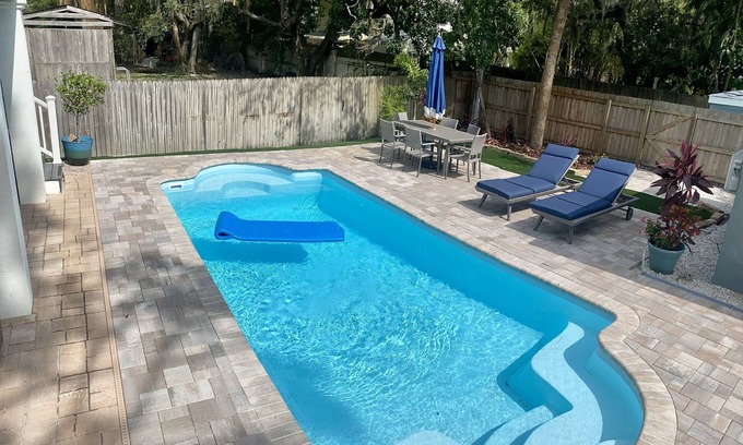 Palm Harbor Casa | Relaxing Beach Style Home with Heated Saltwater Pool in Crystal Beach