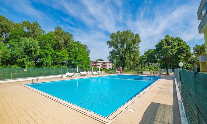 Lido delle Nazioni Apartamento | Apartamento reformado con plaza de aparcamiento en residencia con piscina Lido Nations
