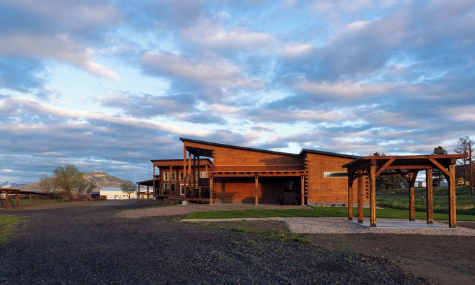 Cody Cabina | Rent 2 luxury cabins: sleep 16! Fire pits, outdoor dining, stunning skies on the edge of Cody.