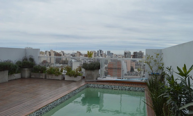 Balvanera Apartamento | RentUp-Mono moderno con balcón y piscina