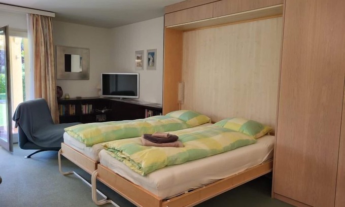 Caslano Apartamento | Residenza Parcolago Apt 018 mit Garten by Interhome