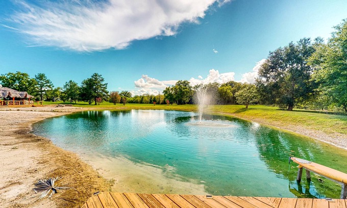 Waller Casa | Resort-Style Oasis with Swimming Pond, Beach, Tropical Hut & Bar