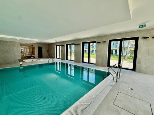 Niechorze Apartamento | Rezydencja Niechorze D202 Boho z Basenem i SPA - 5D Apartments