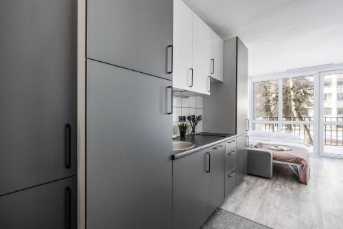 Business District Apartamento | River To The City - Self check in