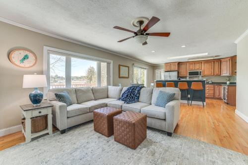 Cheboygan Casa | Riverfront Cheboygan Home with Deck and Boat Dock!
