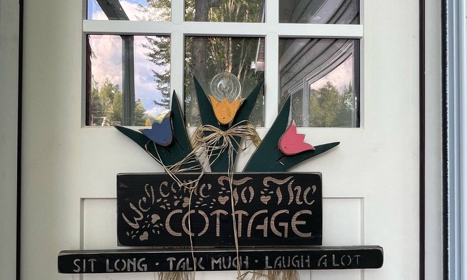 Indian River Cabaña | Riverfront Cottage w/ Boat Docking and easy access to Burt Lake