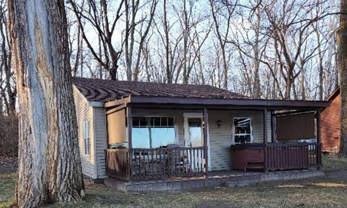 Colton Cabaña | Riverfront Cottage with Hot Tub, Kayaks, Canoes, & Fishing Boats!