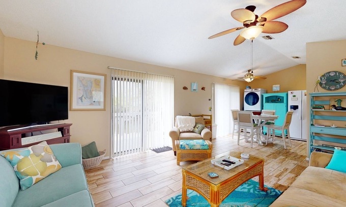 El Jobean Casa | River view home with pool, game tables, playground, scenic balcony, & W/D