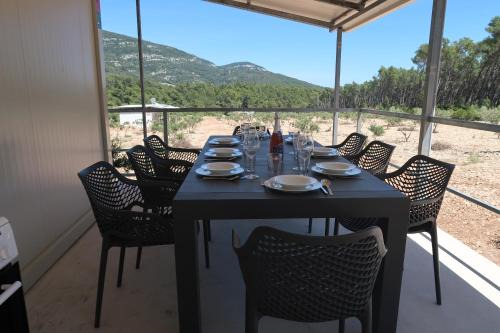 Cara Casa | Robinson olive tree huts