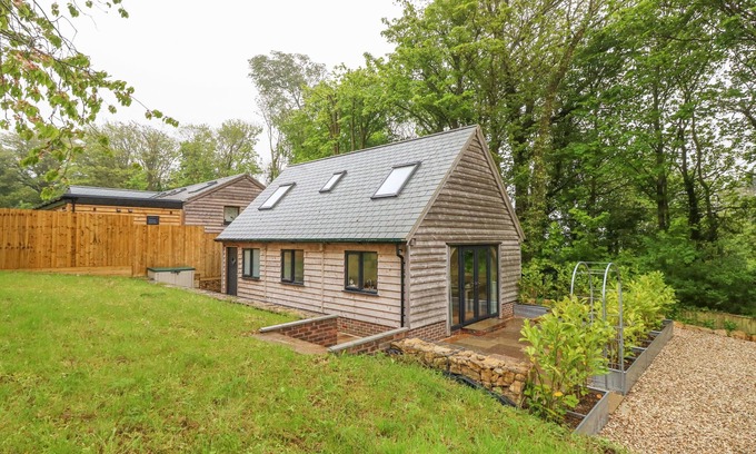 Holworth Cabaña | ROMAN LODGE, pet friendly, with a garden in Osmington