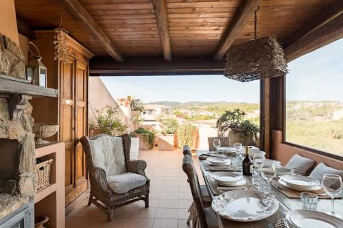 Porto Pozzo Casa | Romantico Appartamento Vista Mare