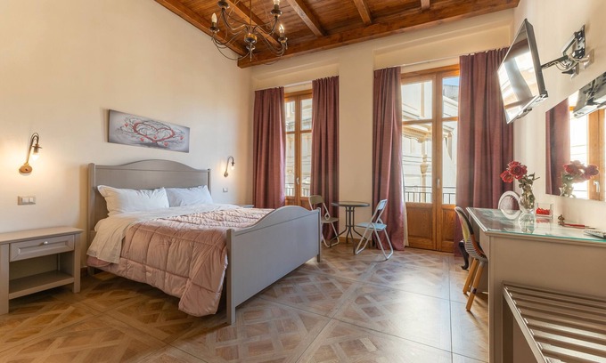 Licata Apartamento | Habitación 'Al Duomo - Camera Queen' con terraza compartida, Wi-Fi y aire acondicionado.